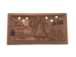 Tablette de chocolat Angel dans le paysage d'hiver